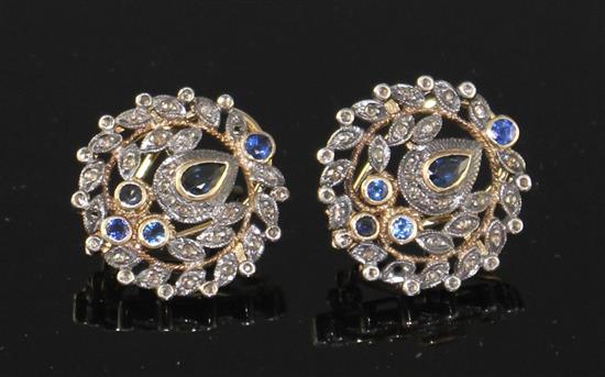 A pair of 20th century Indian style 18k yellow metal and 925 white metal, rose cut diamond and shaped sapphire set foliate earring,
